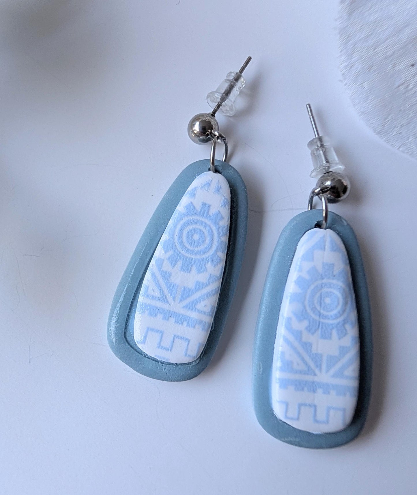 Pre-Columbian style drop earrings - Handmade - Aztec motifs - Polymer clay and stainless steel - Baby blue