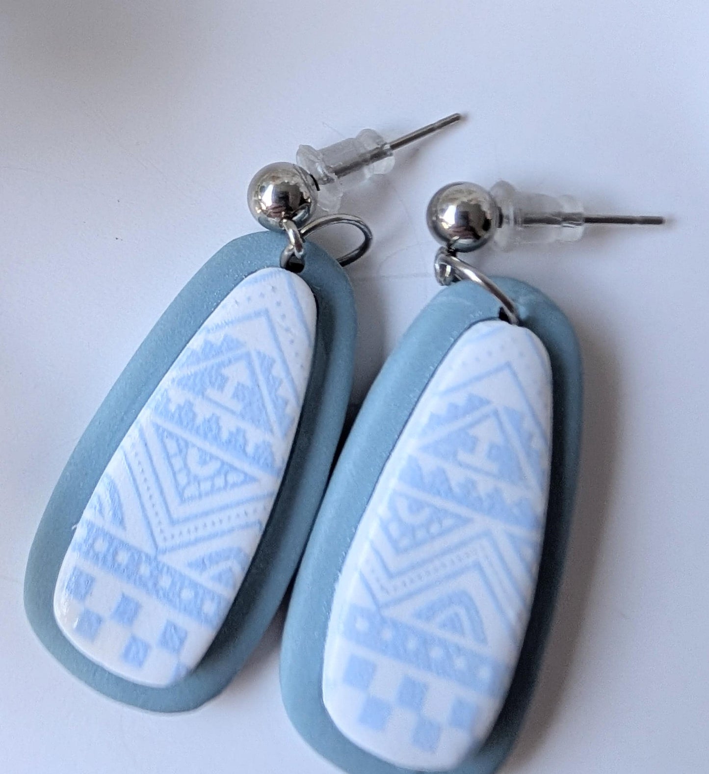 Pre-Columbian style drop earrings - Handmade - Aztec motifs - Polymer clay and stainless steel - Baby blue