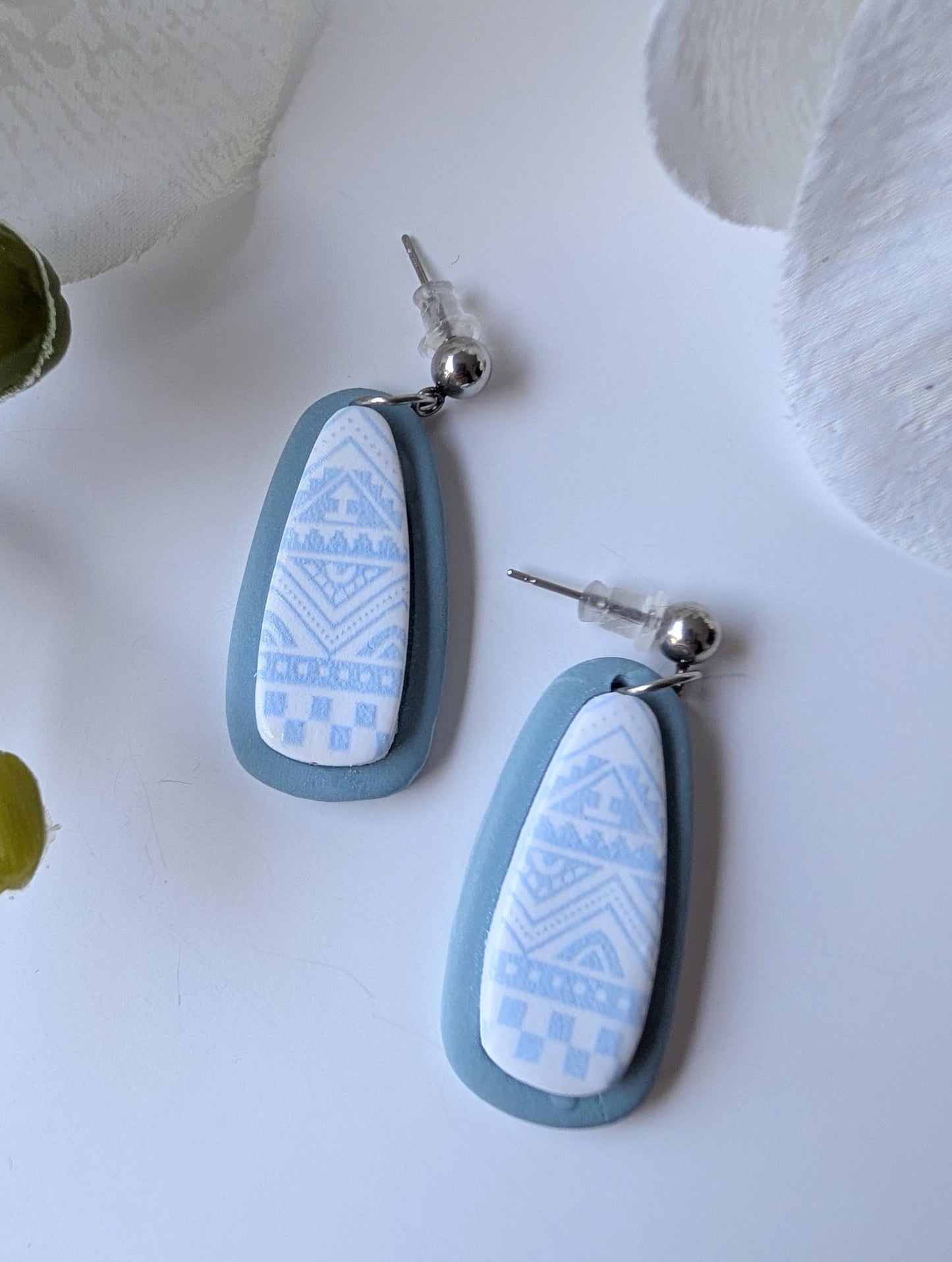 Pre-Columbian style drop earrings - Handmade - Aztec motifs - Polymer clay and stainless steel - Baby blue