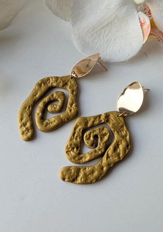 Boucles d’oreilles tribales spirales martelées
